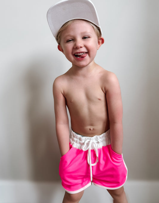 PINK SWIM SHORTS