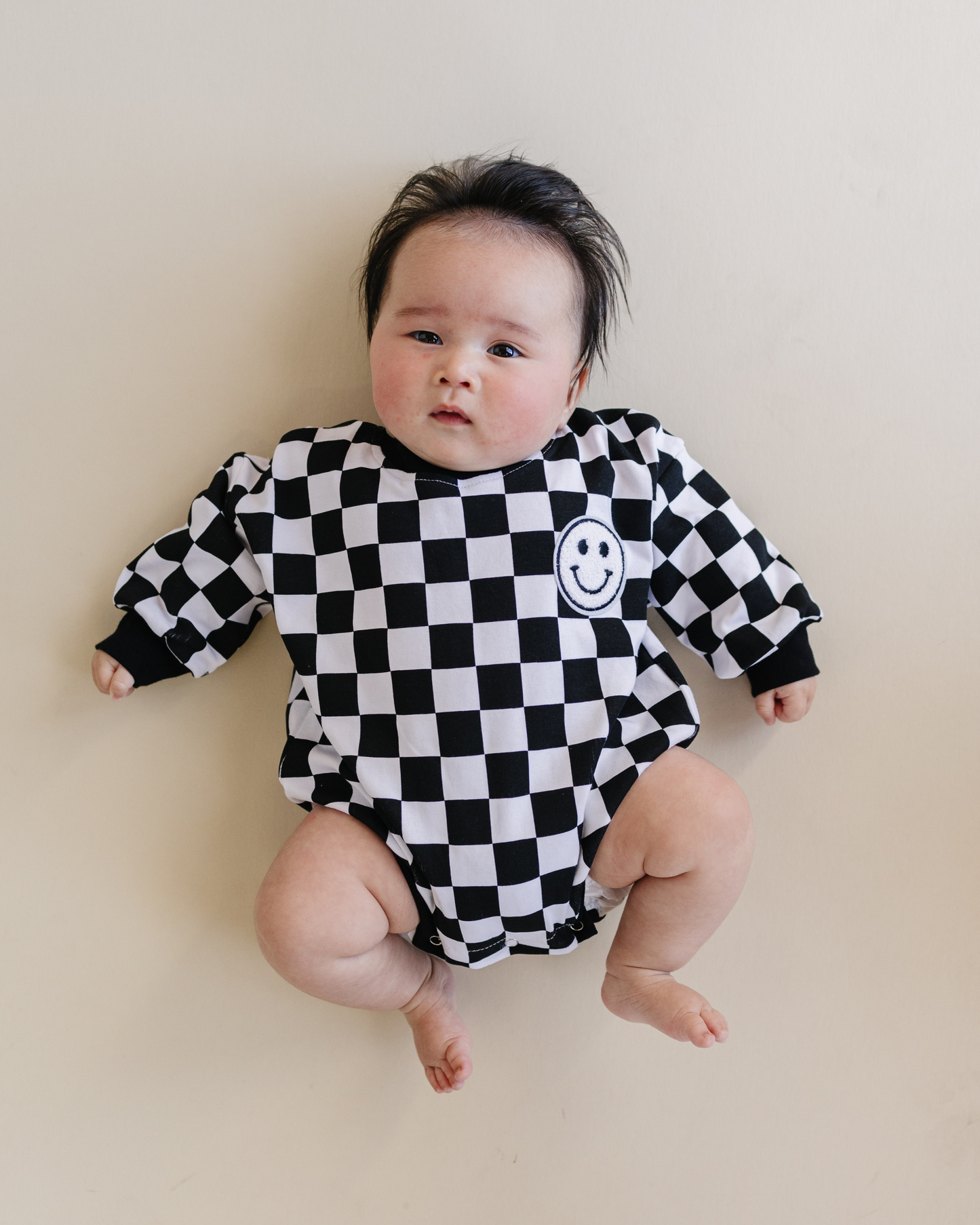 Bubble Romper | Checkered Smiley Black